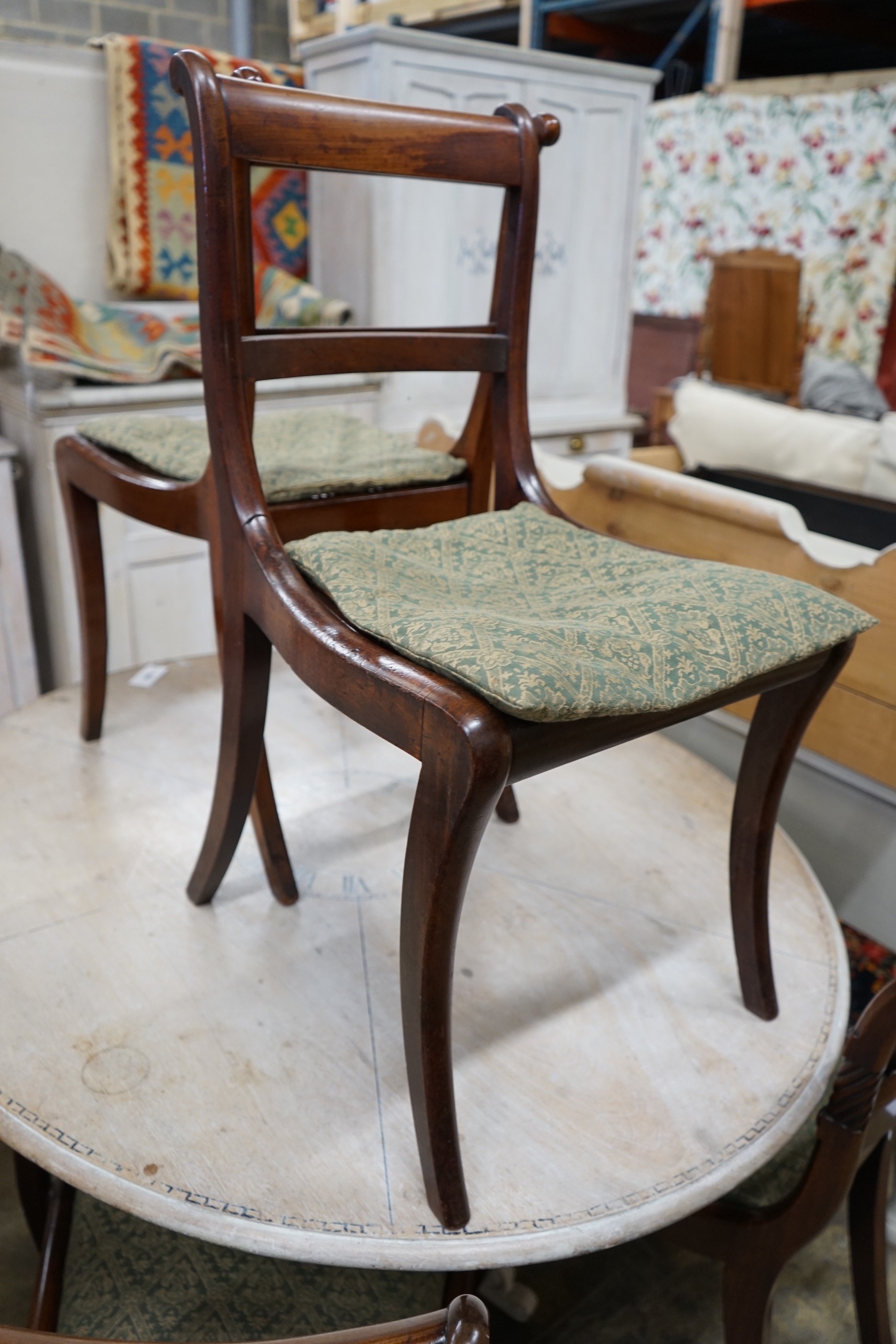 Six Regency mahogany cane and drop in seat dining chairs (four plus two)